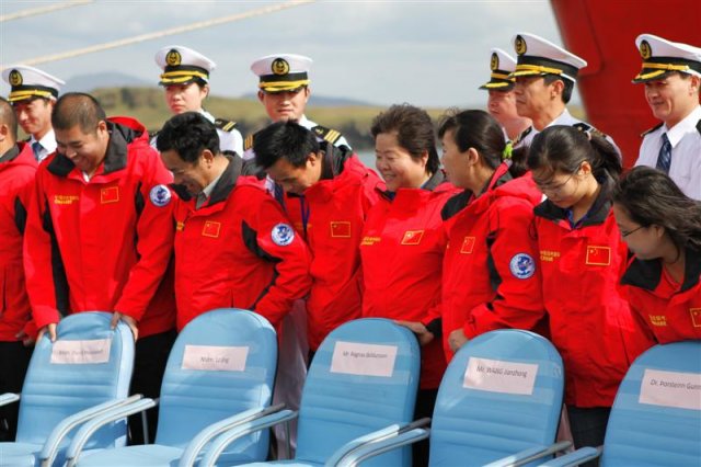Lining up for a photo with the president.