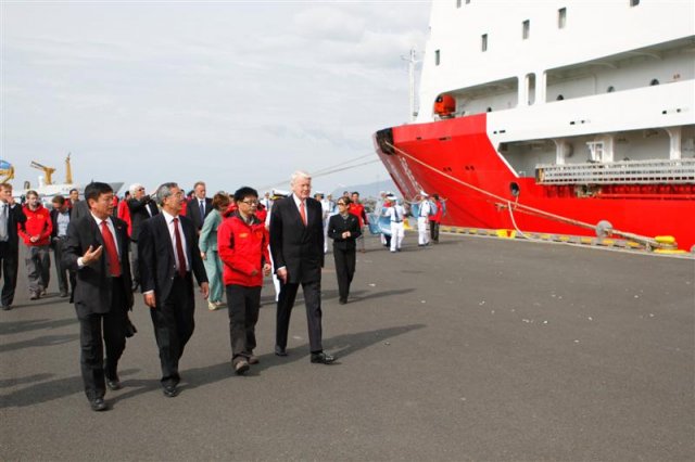 The president walking towards the Xuelong.