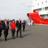 The president walking towards the Xuelong.