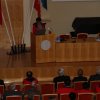 Dr. Yang speaking at the symposium.